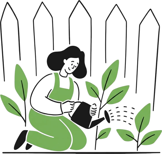 A woman watering plants by a fence